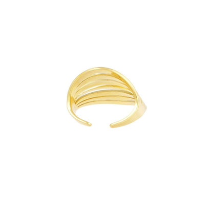 Gold ring with multiple bands on a white background
