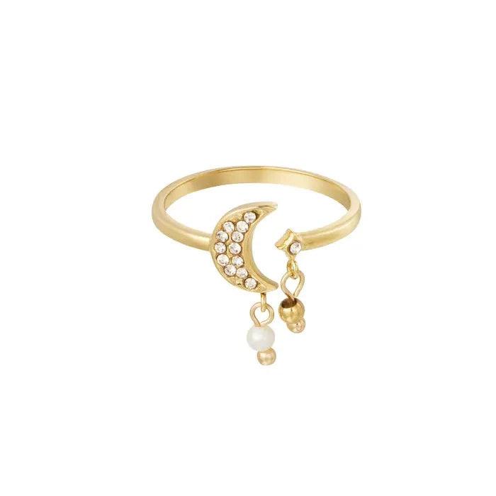 ring  with moon shape and rhinestone in the moon and pearl hanging